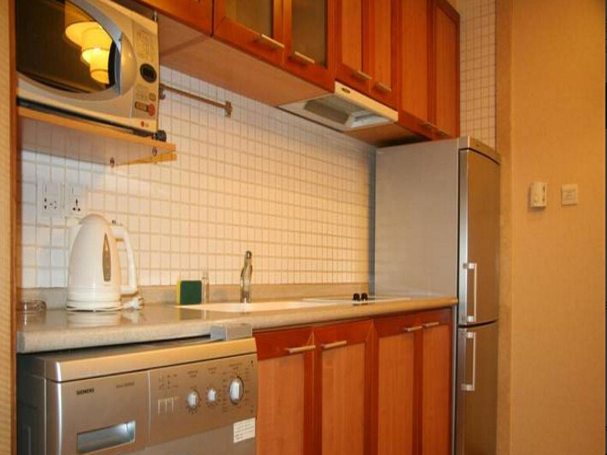 Dalian Asia Pacific Service Apartment Bagian luar foto